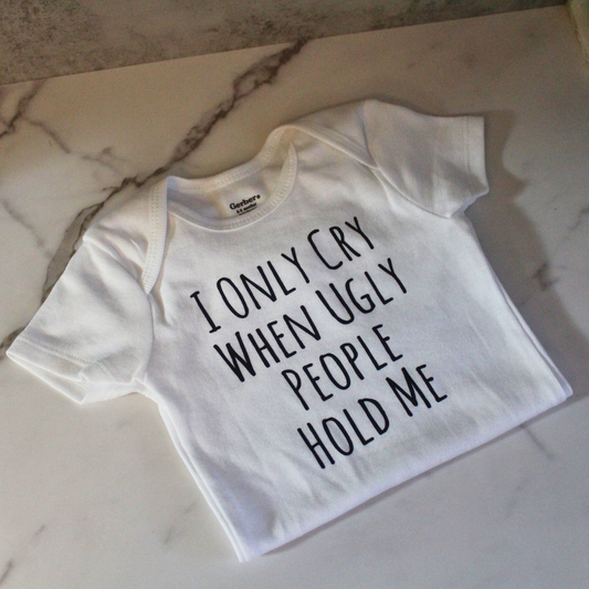 I Only Cry When Ugly People Hold Me Onesie
